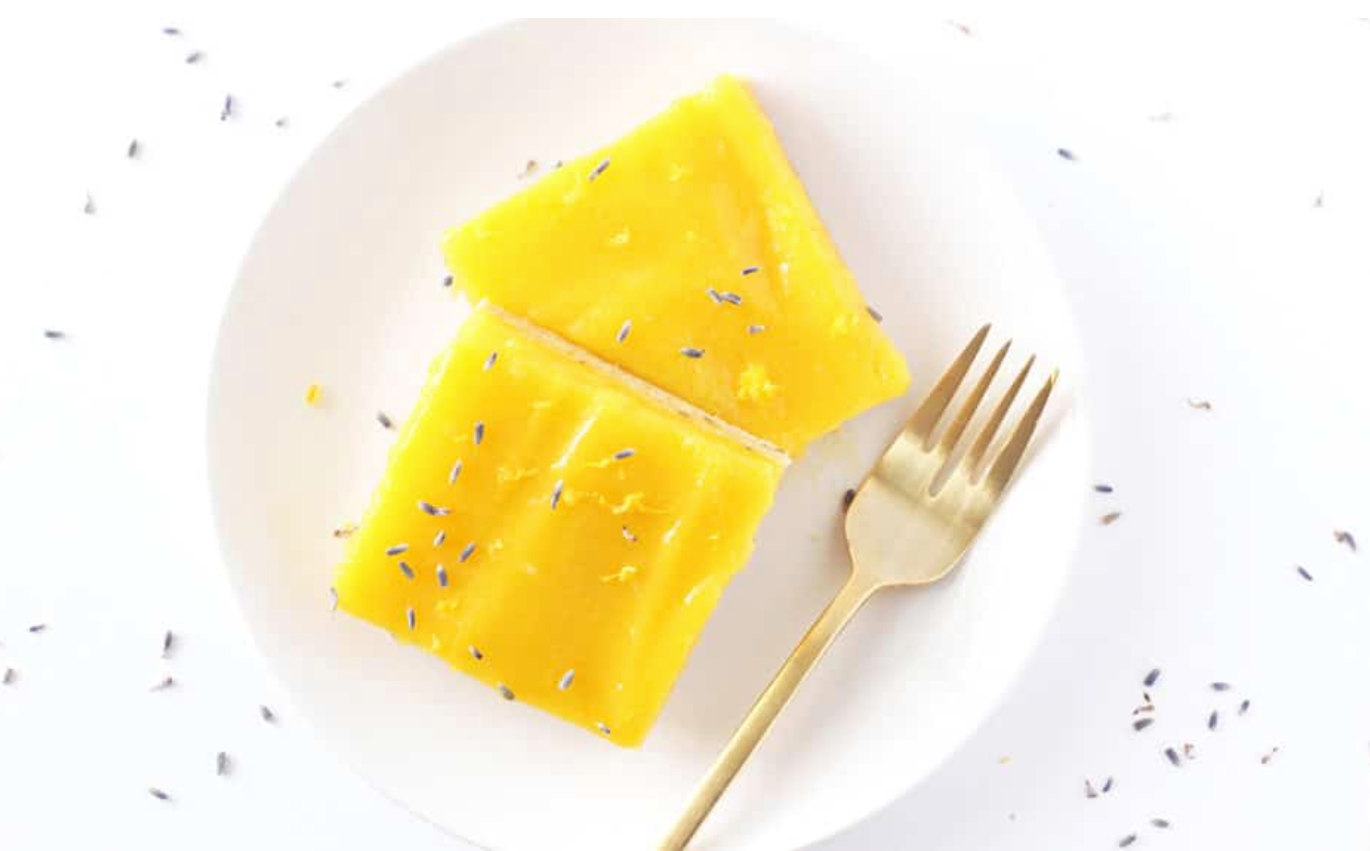  Miss Jones Baking Co Lavender Lemon Bar on a plate with a fork