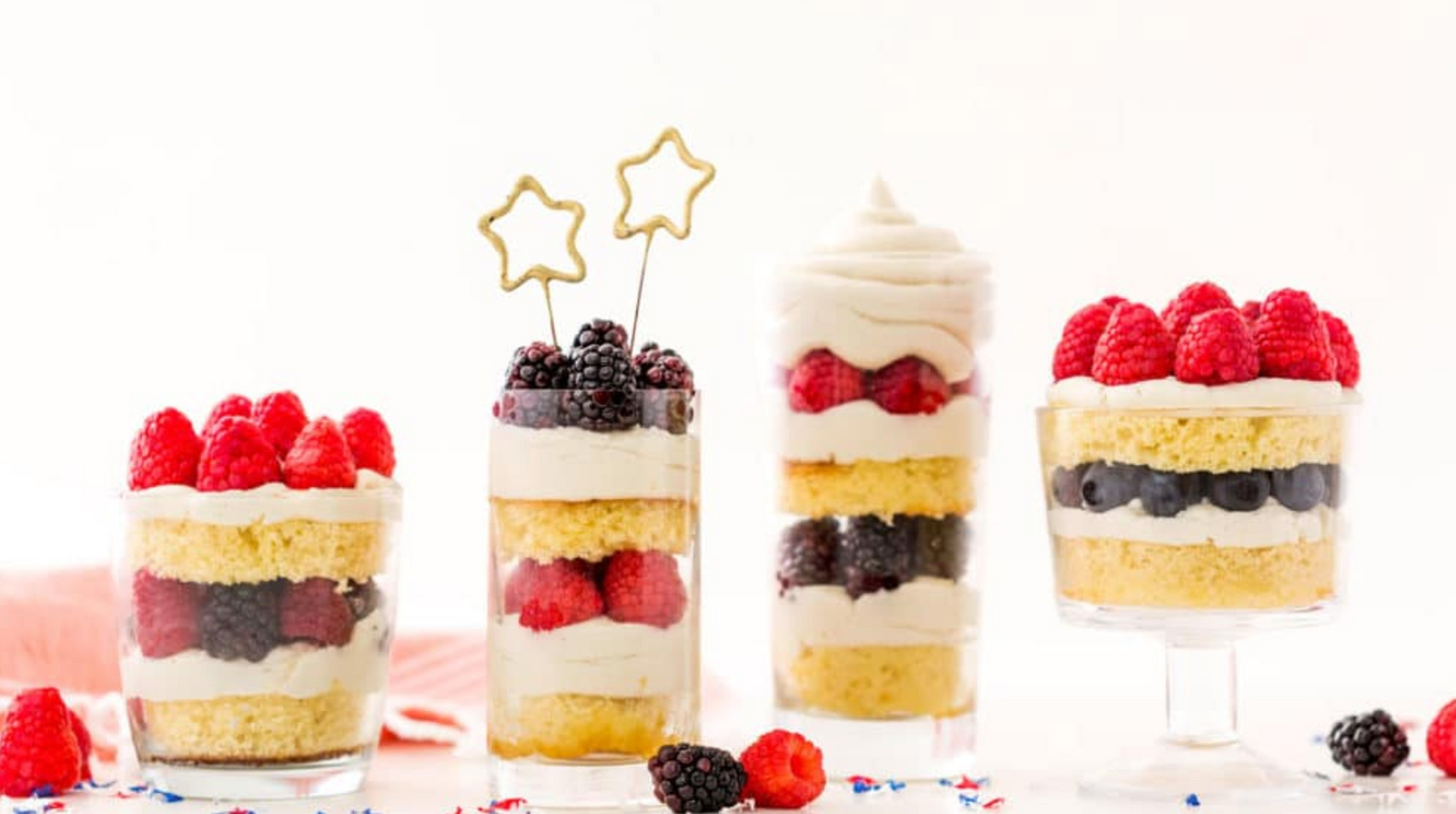 Image of three Miss Jones Baking Co Red, White and Blue Berries and Cream Cake Parfaits